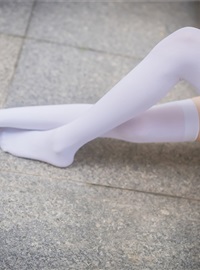 Rabbit plays with painted white stockings over the knee(6)